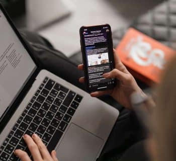 person holding black iphone 4