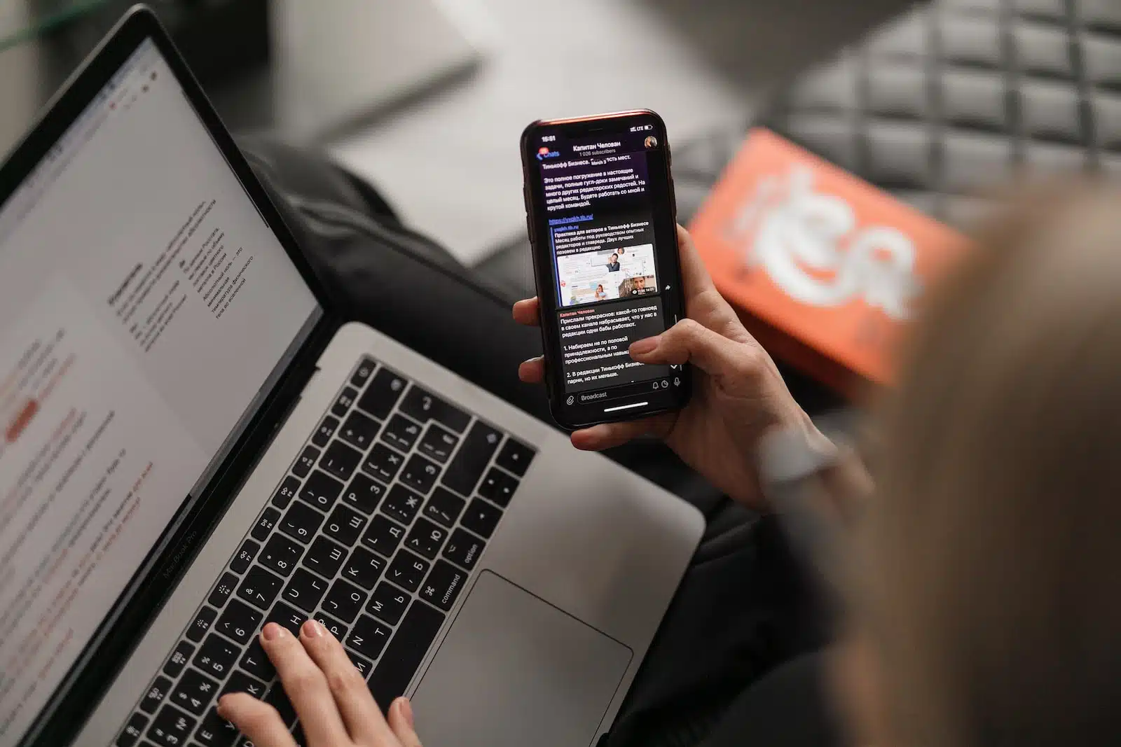 person holding black iphone 4