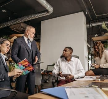 Office Team Having a Meeting at the Table